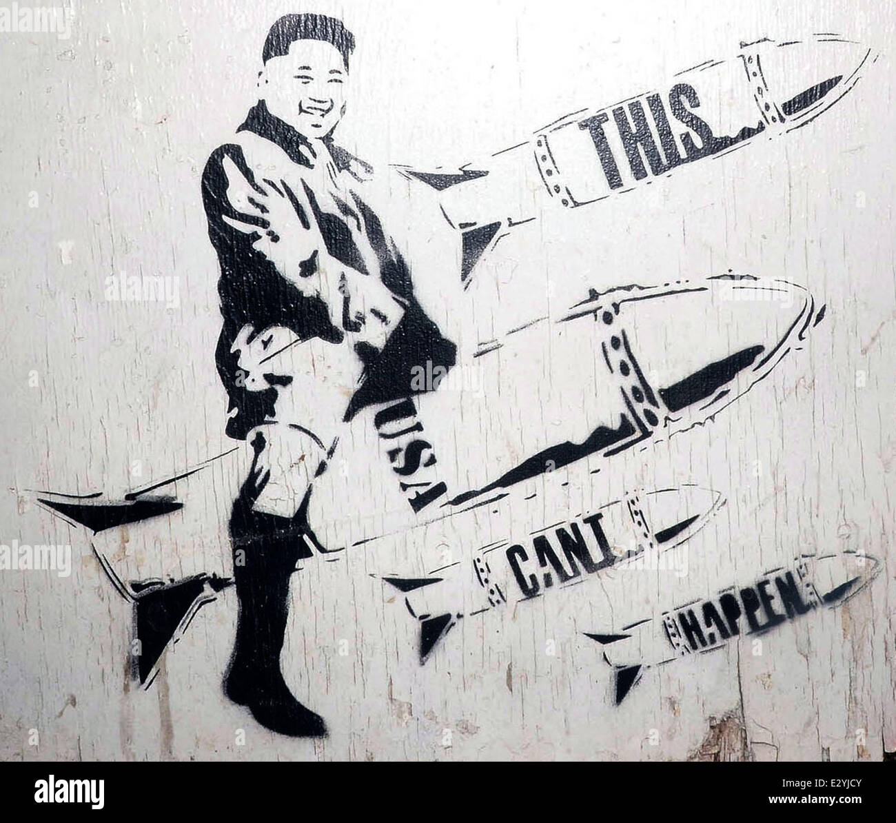 Street art work of Kim Jong-un riding a missile 'This USA Can't Happen' in Eastcastle Street  Featuring: Kim Jong-un Where: London, United Kingdom When: 11 Apr 2013 Stock Photo