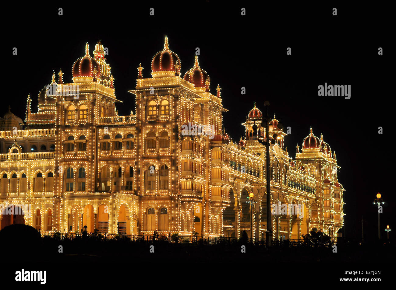 Mysore Palace in India illuminated at night Stock Photo