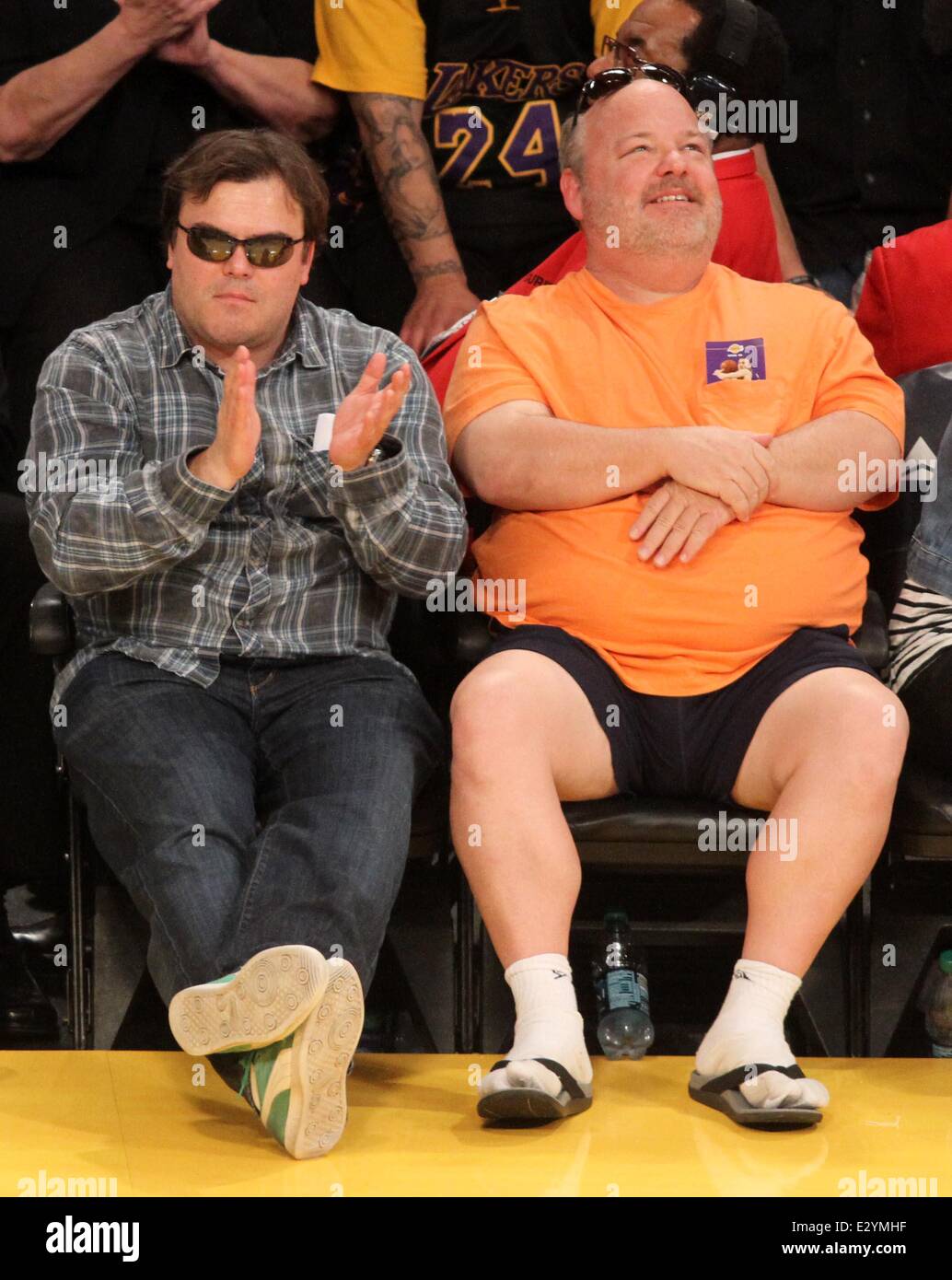 Celebrities watch the LA Lakers vs. the Golden State Warriors at the Staples Center  Featuring: Jack Black,Kyle Gass Where: Los Angeles, California, United States When: 12 Apr 2013 Stock Photo