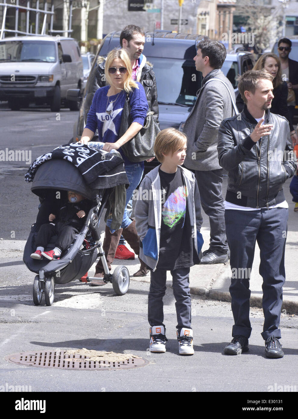 Kate Hudson takes her son Bingham Hawn Bellamy out in a stroller and head for lunch with family at Bubby's restaurant in Manhattan  Featuring: Kate Hudson,Matt Bellamy,Bingham Bellamy,Ryder Robinson Where: New York City, NY, United States When: 17 Apr 2013 Stock Photo