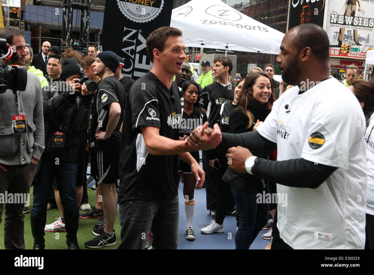2013 Celebrity Kickball Game in Times Square in New York City.  Featuring: Ryan Lochte,Donovan McNabb Where: New York, New York, United States When: 23 Apr 2013 Stock Photo