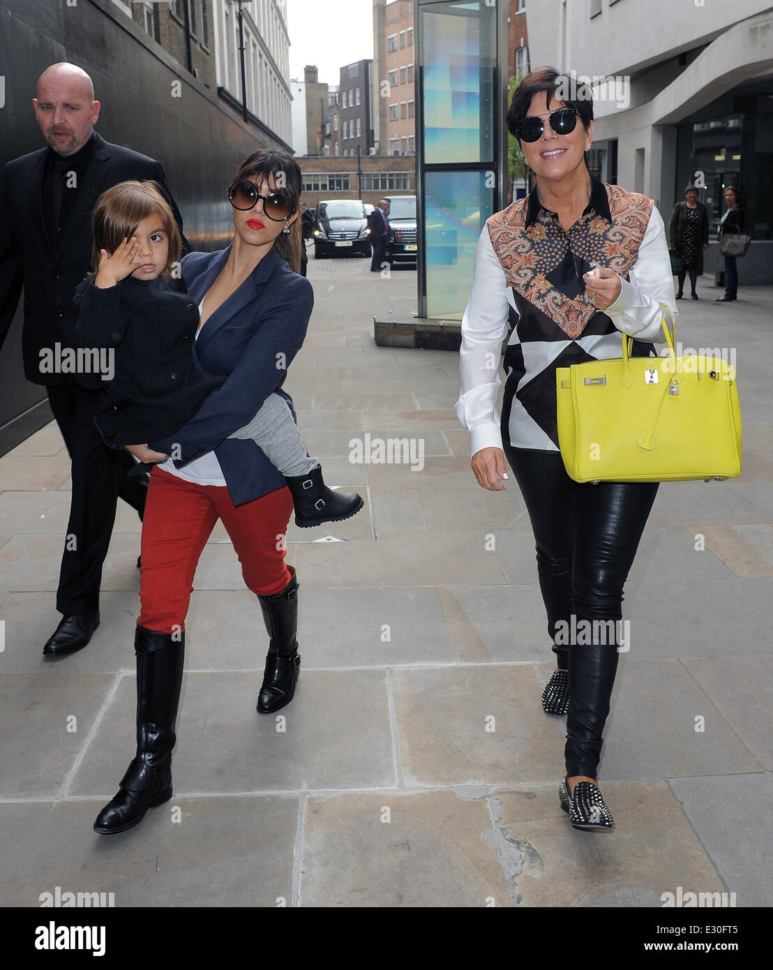 Kourtney Kardashian and Kris Jenner walk around Mayfair with Kourtney  holding her son Mason Disick, and Kris clutching a 0,500 (£6,900) Hermes  Birkin handbag Featuring: Kris Jenner,Mason Disick,Kourtney Kardashian  Where: London, United