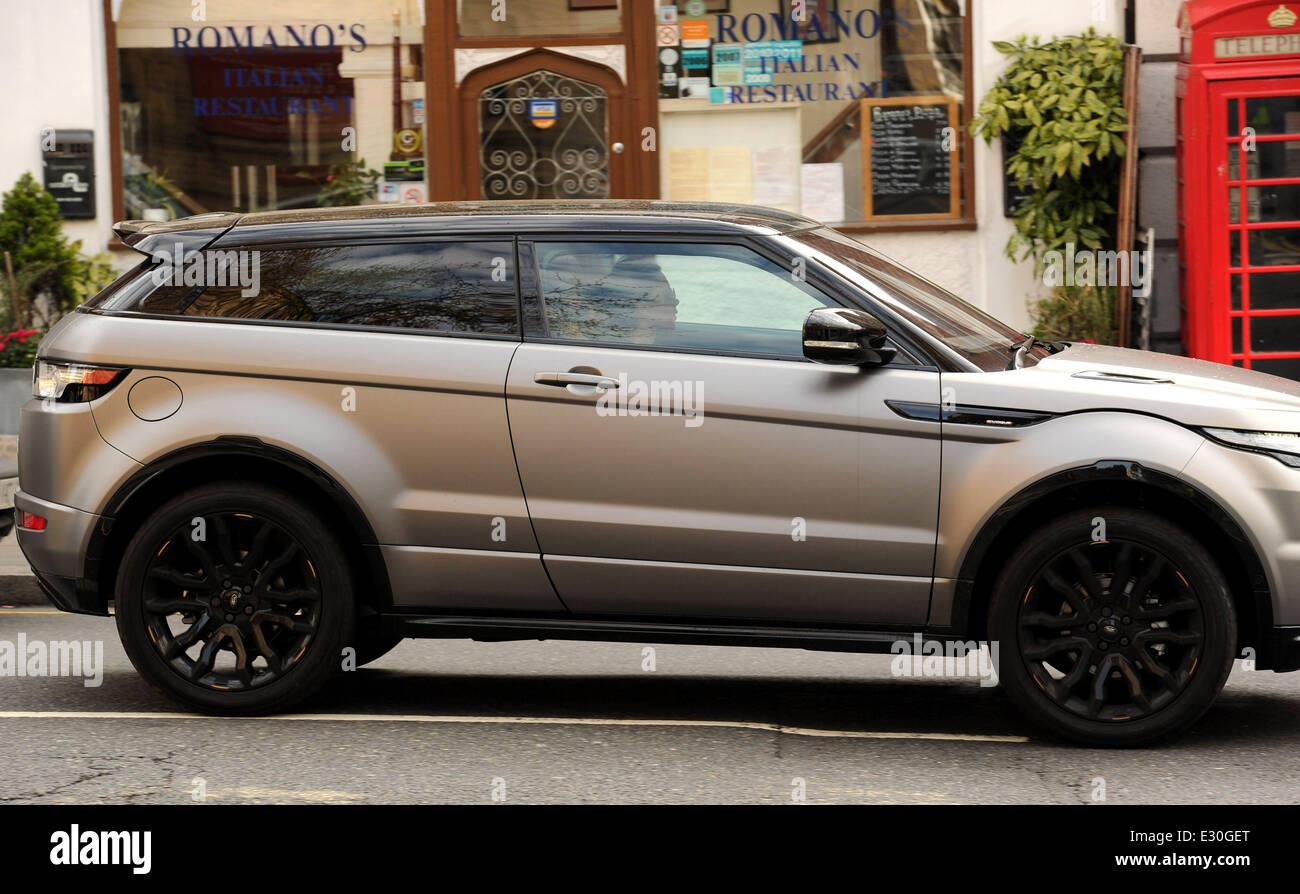 Victoria Beckham driving her Range Rover in central London
