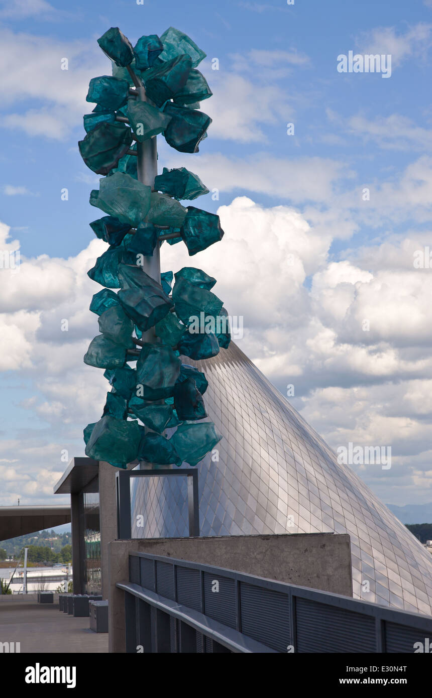 Glass sculpture and the Tacoma glass museum chimney. Stock Photo