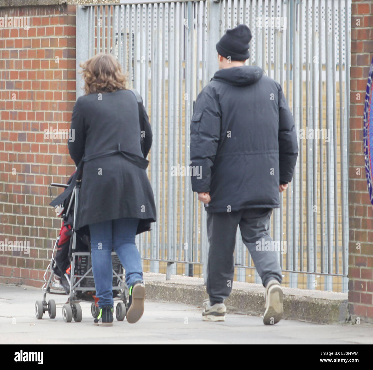 Blur singer Damon Albarn dressed casual in trainers and jogging bottoms  takes a stroll with a