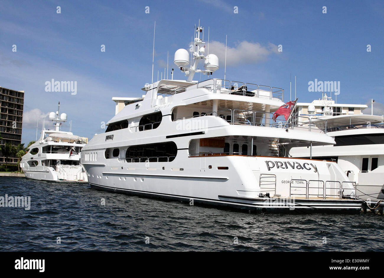 The super yacht 'Mine Games' owned by Chris Cline, top is parked in front of 'Privacy', owned by Tiger Woods, bottom,  Cline is said to be dating Elin Nordegren, Tigers Woods ex-wife. The yachts are seen here  docked in Jupiter Florida Monday April 29, 2013  Featuring: Atmosphere Where: Jupiter, Florida, United States When: 29 Apr 2013 Stock Photo