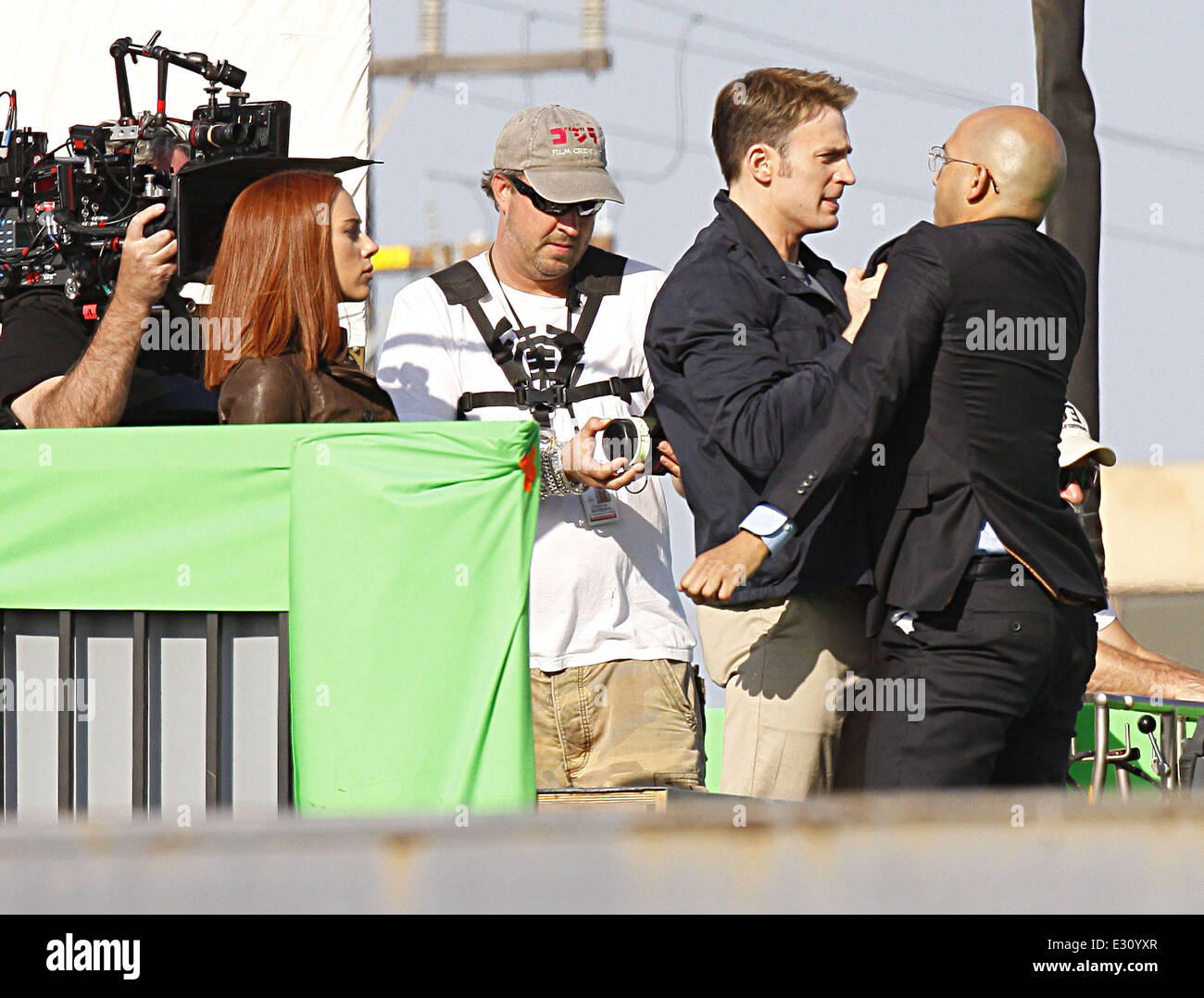 Scarlett Johansson and Chris Evans filming scenes for their new movie 'Captain America: Winter Soldier' on location in Los Angeles  Featuring: Scarlett Johannsson,Chris Evans Where: Los Angeles, California, United States When: 29 Apr 2013 Stock Photo