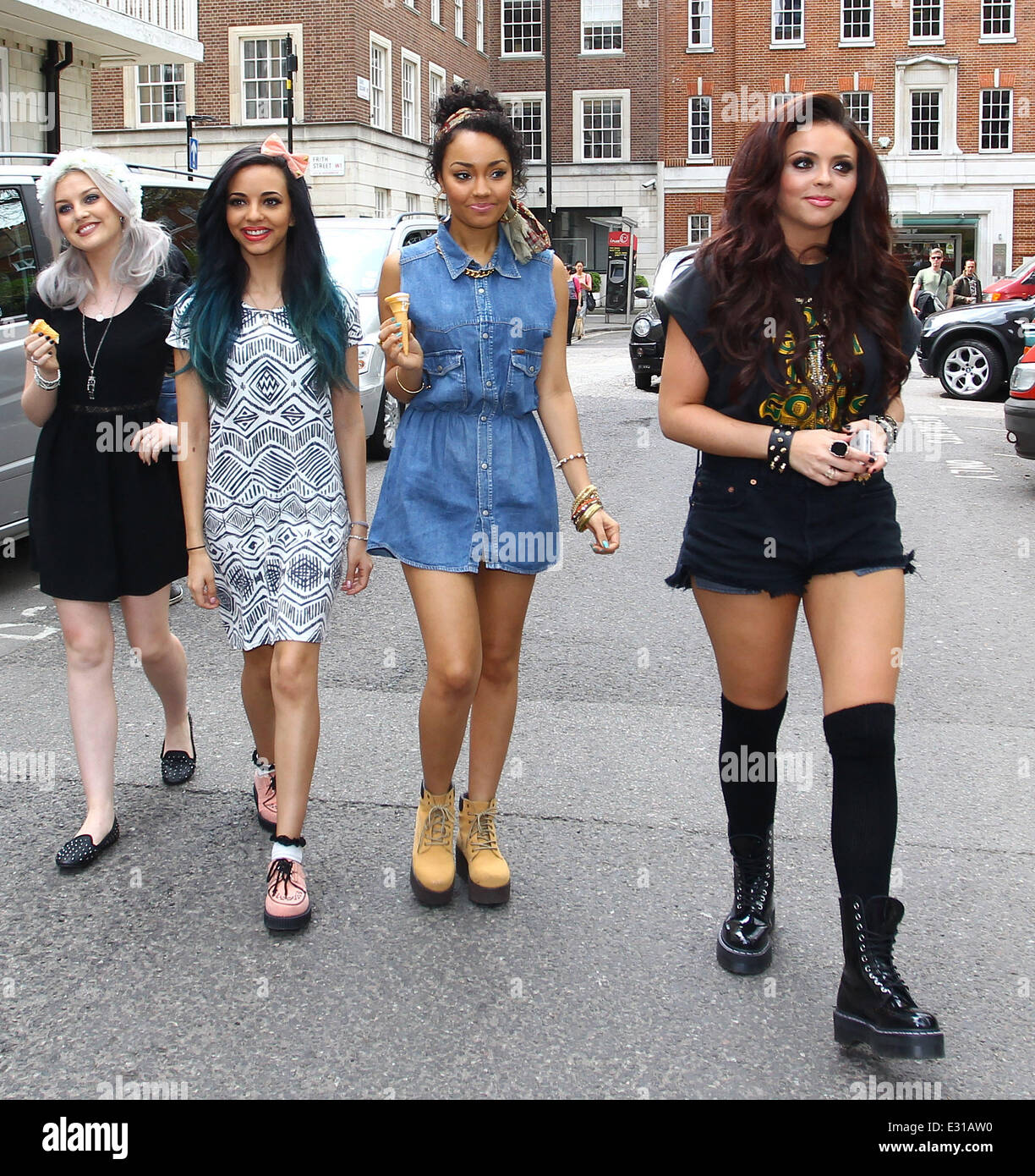Little Mix serve ice cream in Soho Square to promote their new single 'How Ya Doin?', featuring Missy Elliott  Featuring: Jesy N Stock Photo