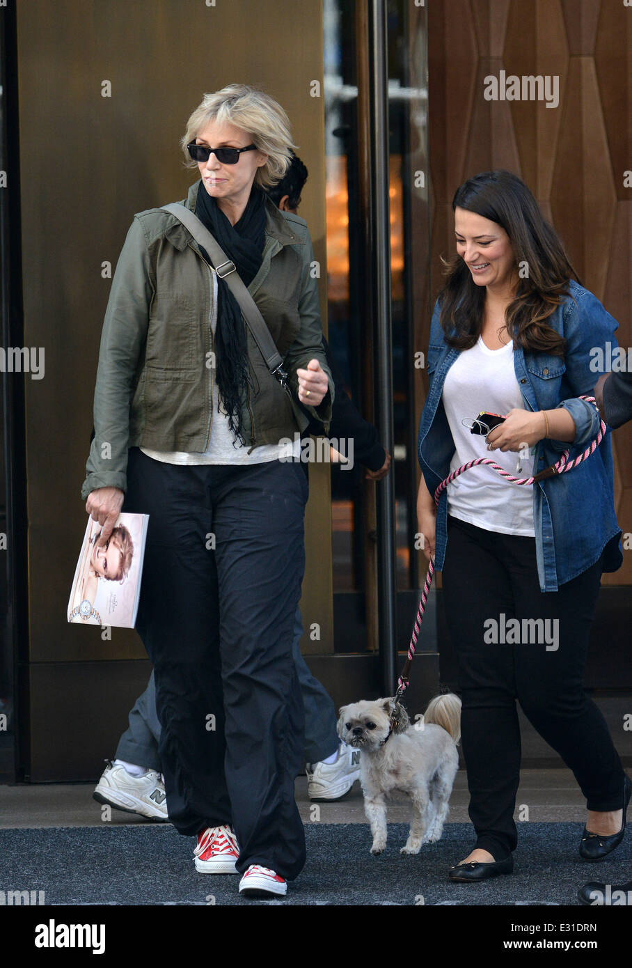 Jane Lynch and her wife Lara Embry walk their dog in Soho, NYC