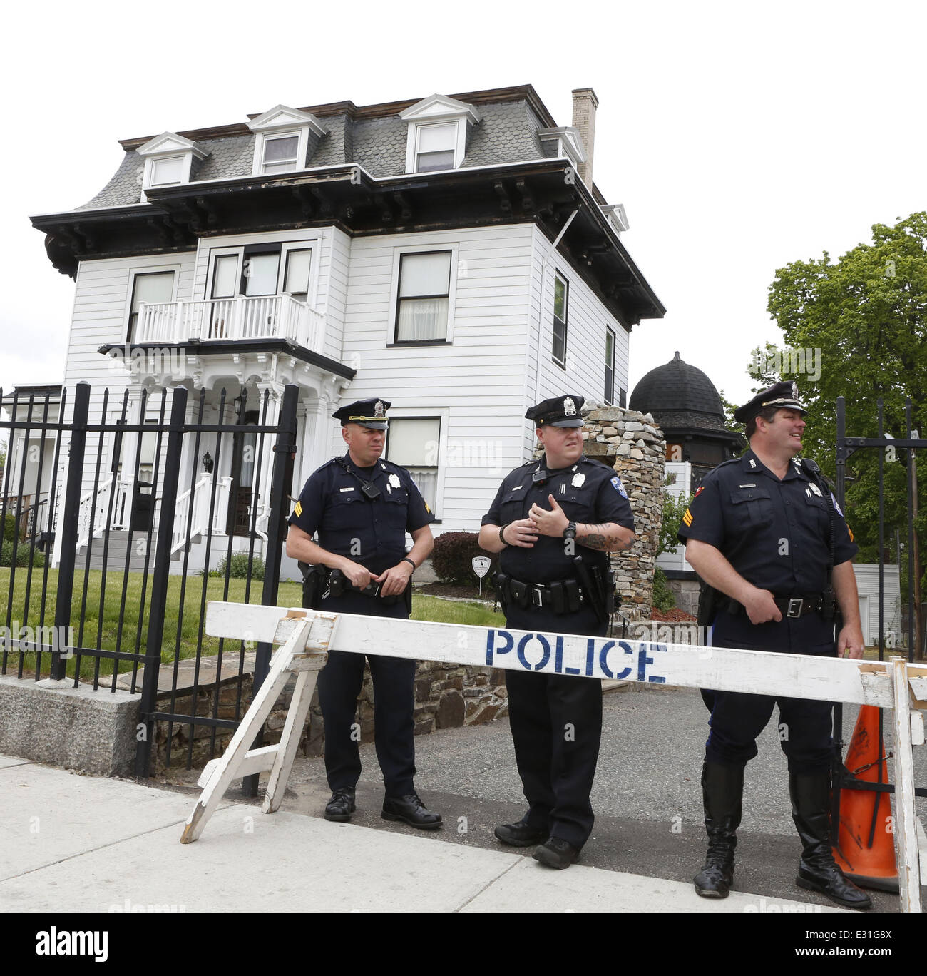 Police officers stand guard in front of Worcester's Graham, Putnam and