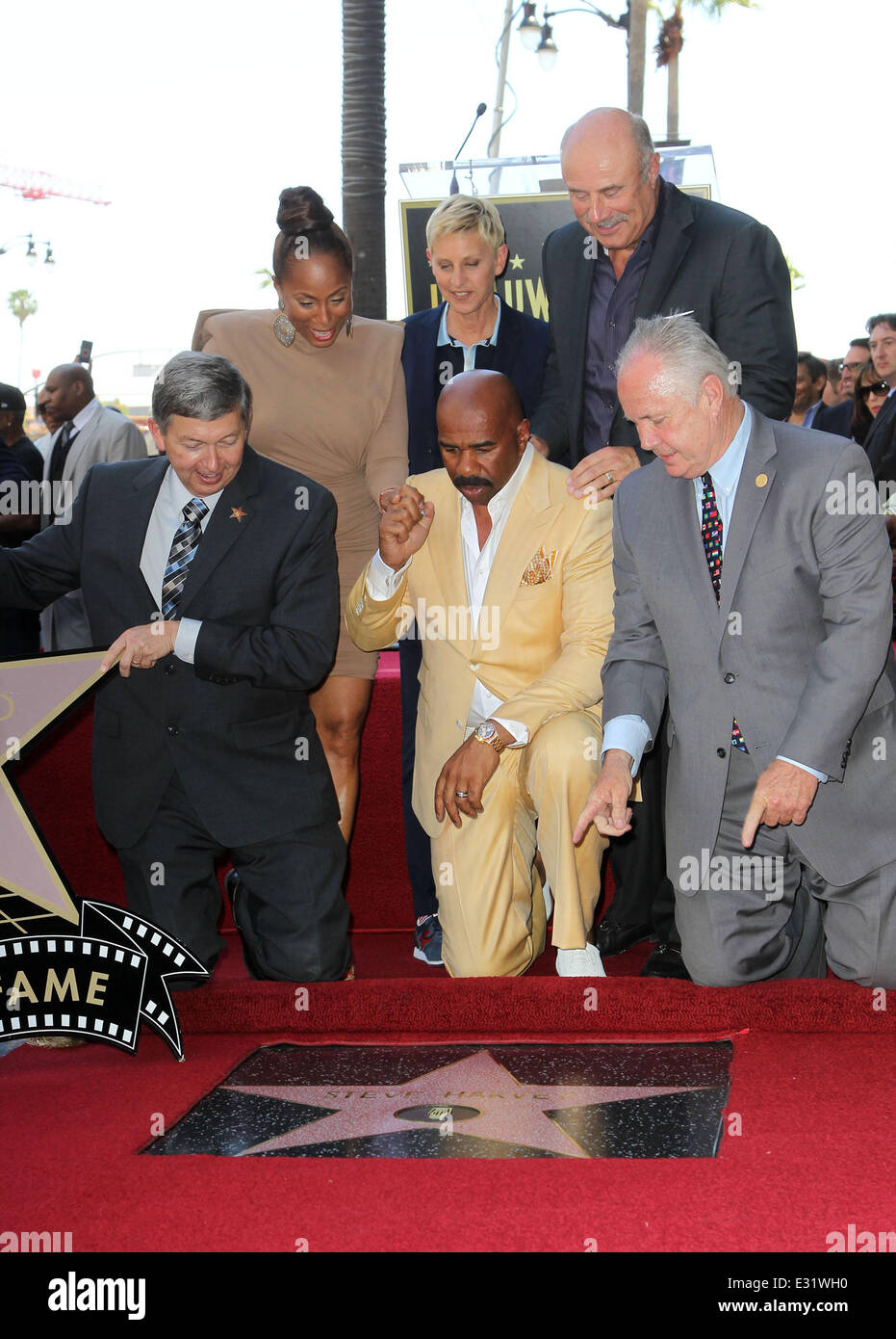 Steve Harvey is honoured with a star on the Hollywood Walk of Fame  Featuring: Leron Gubler,Marjorie Bridges-Woods,Ellen DeGeneres,Dr. Phil McGraw,Steve Harvey,Councilman Tom Labonge Where: Los Angeles, California, United States When: 13 May 2013 Stock Photo