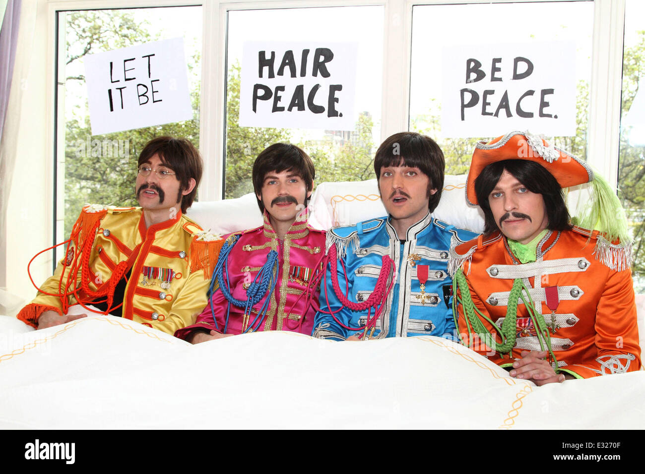 The cast of Beatles show 'LET IT BE' recreate the John Lennon and Yoko  Ono's famous 'bed-in' scene, dressed in full Sgt Pepper costume to coincide  with the announcement that the show
