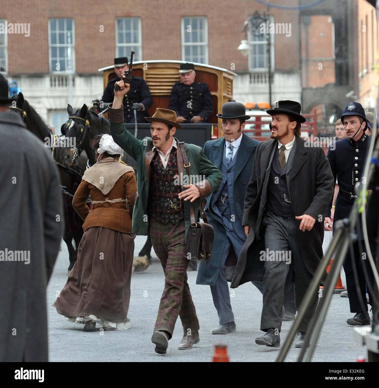 Matthew McFadyen, Jermome Flynn and Adam Rothenberg filming scenes for BBC's Ripper Street on North Great Georges Street. In the scene a police detective is thrown out of a window and impaled on the railings outside. Senator David Norris who lives on the same street, came out to watch filming at his neighbours home  Where: Dublin, Ireland When: 21 May 2013  **Not available for publication in Irish Tabloids or Irish magazines** Stock Photo