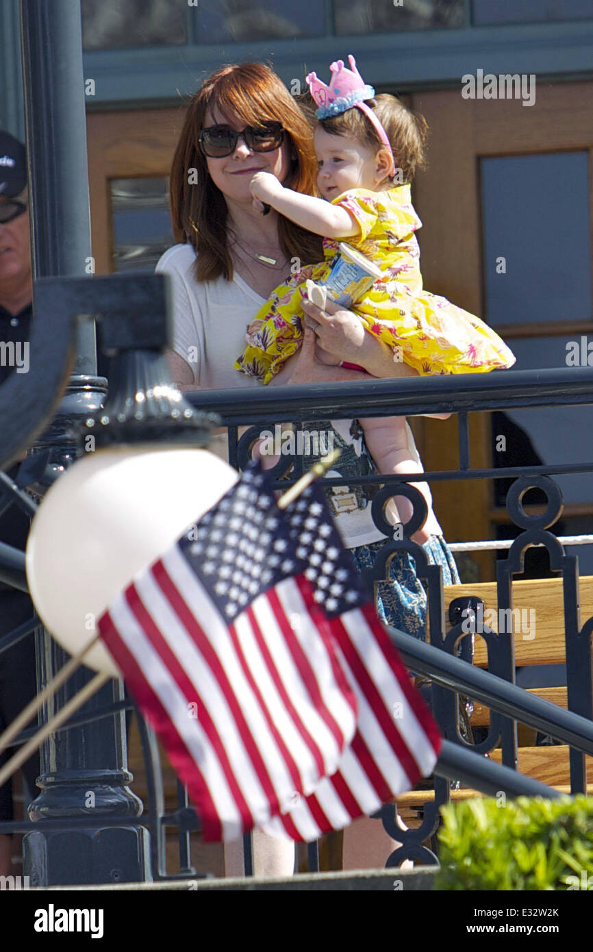 Alyson Hannigan and her family celebrate her daughter Keeva's first birthday with a trip to Disneyland  Featuring: Alyson Hannigan,Keeva Jane Denisof Where: Anaheim, CA, United States When: 23 May 2013 Stock Photo