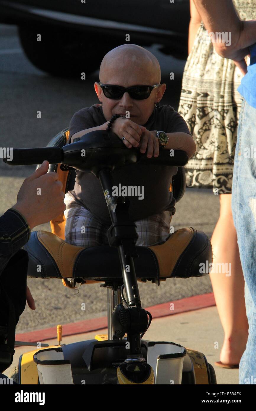 Verne Troyer riding on his scooter on Little Santa Monica Boulevard in