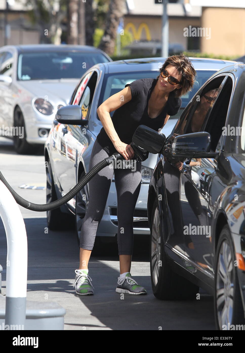 Lisa Rinna seen pumping gas into her car in Studio City Featuring