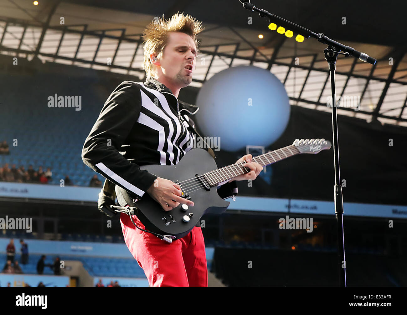 Muse performs live on their 'The 2nd Law World Tour' at Etihad Stadium  Featuring: Matt Bellamy,Muse Where: Manchester, England, United Kingdom  When: 01 Jun 2013 Stock Photo - Alamy