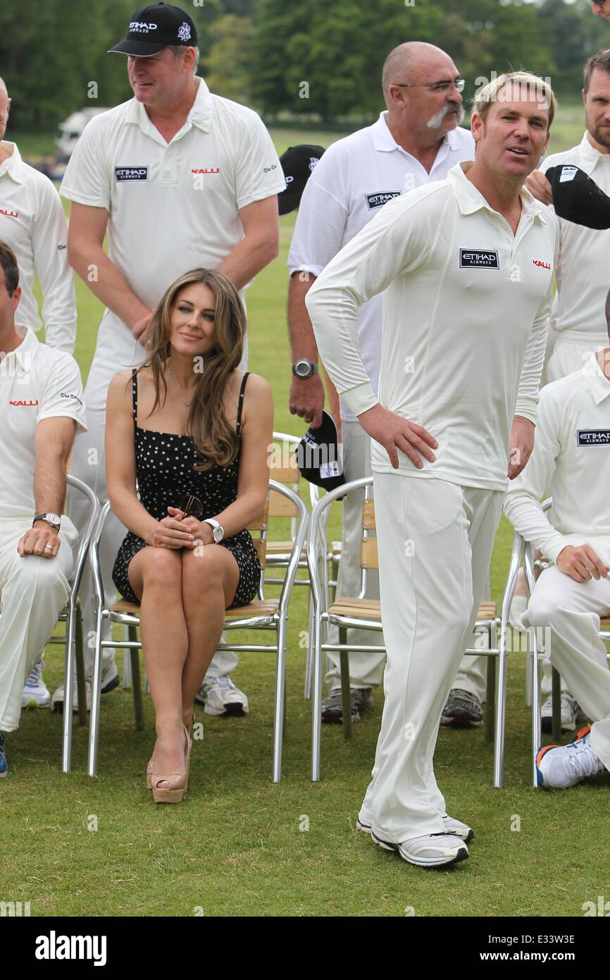 Elizabeth Hurley and Shane Warne host a cricket match between an Australian 11 and an English 11 in aid of the Shane Warne Foundation and Hop Skip and Jump during Cricket for Kids Day at Cirencester Cricket Club  Featuring: Elizabeth Hurley,Shane Warne Wh Stock Photo