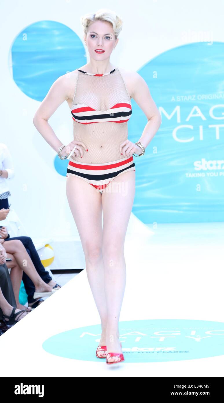 Models wearing retro bathing suits and lounge wear curated by Carol Ramsey at 'Magic City' Season 2 Premiere Fashion Event at Duffy Square in Times Square  Featuring: Model Where: New York City, NY, United States When: 12 Jun 2013 Stock Photo