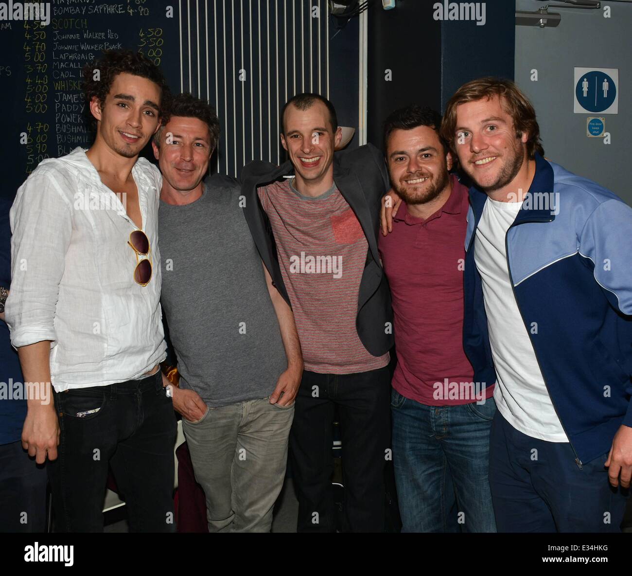 The cast of Love/Hate, both alive and dead, have a drink with Tom Vaughan Lawlor after his performance in the Mark O'Rowe play 'Howie The Rookie' at the Project Arts Centre  Featuring: Robert Sheehan,Aidan Gillen,Tom Vaughan Lawlor,Laurence Kinlan,Peter Coonan Where: Dublin, Ireland When: 18 Jun 2013 Stock Photo