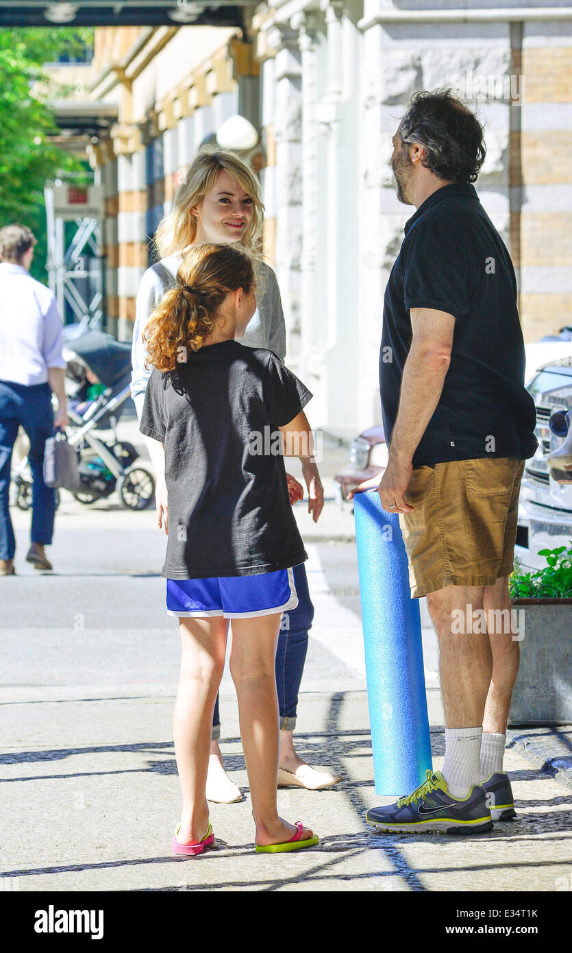 Actress Emma Stone goes to Bubbys restaurant in Manhattan where she runs into director Judd Apatow and his daughter. The pair chatted and Judd goofed around up for the cameras, waving a foam tube in the air  Featuring: Emma Stone,Judd Apatow Where: Manhattan, NY, United States When: 20 Jun 2013 ENN.com Stock Photo