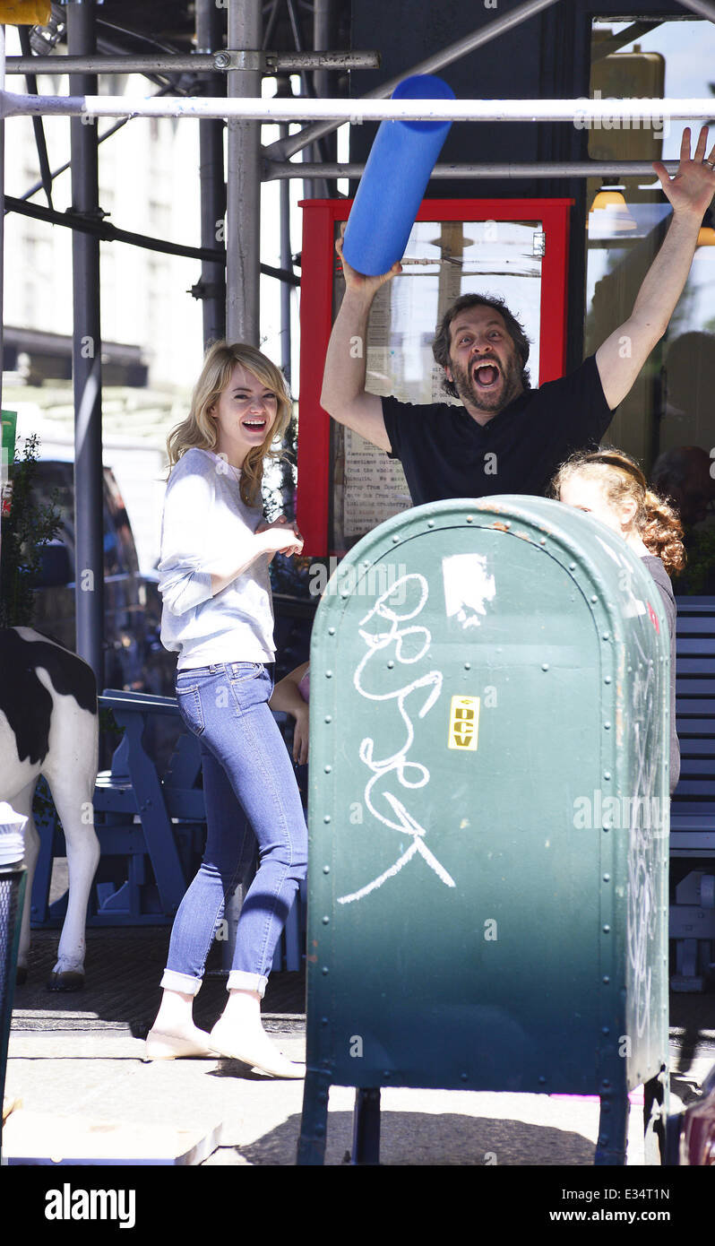 Actress Emma Stone goes to Bubbys restaurant in Manhattan where she runs into director Judd Apatow and his daughter. The pair chatted and Judd goofed around up for the cameras, waving a foam tube in the air  Featuring: Emma Stone,Judd Apatow Where: Manhat Stock Photo