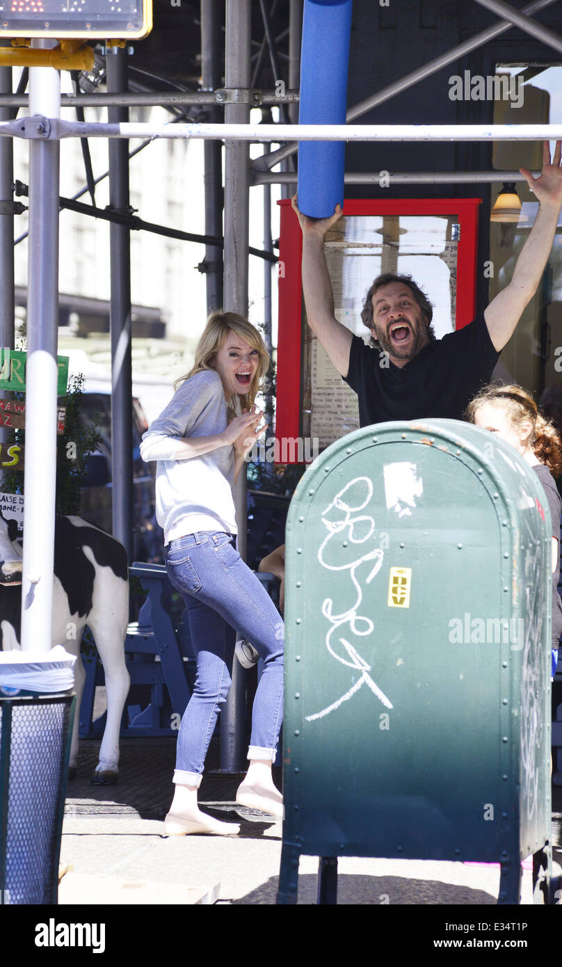 Actress Emma Stone goes to Bubbys restaurant in Manhattan where she runs into director Judd Apatow and his daughter. The pair chatted and Judd goofed around up for the cameras, waving a foam tube in the air  Featuring: Emma Stone,Judd Apatow Where: Manhat Stock Photo