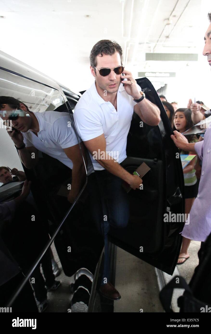Henry Cavill arrives at LAX airport on an international flight  Featuring: Henry Cavill Where: Los Angeles, CA, United States When: 26 Jun 2013 Stock Photo