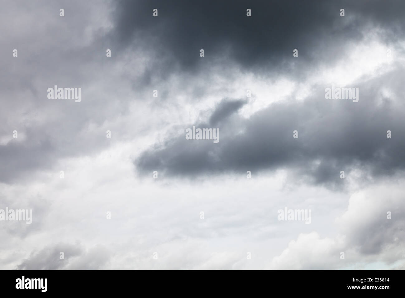 dark grey rainy clouds in overcast sky in summer Stock Photo - Alamy