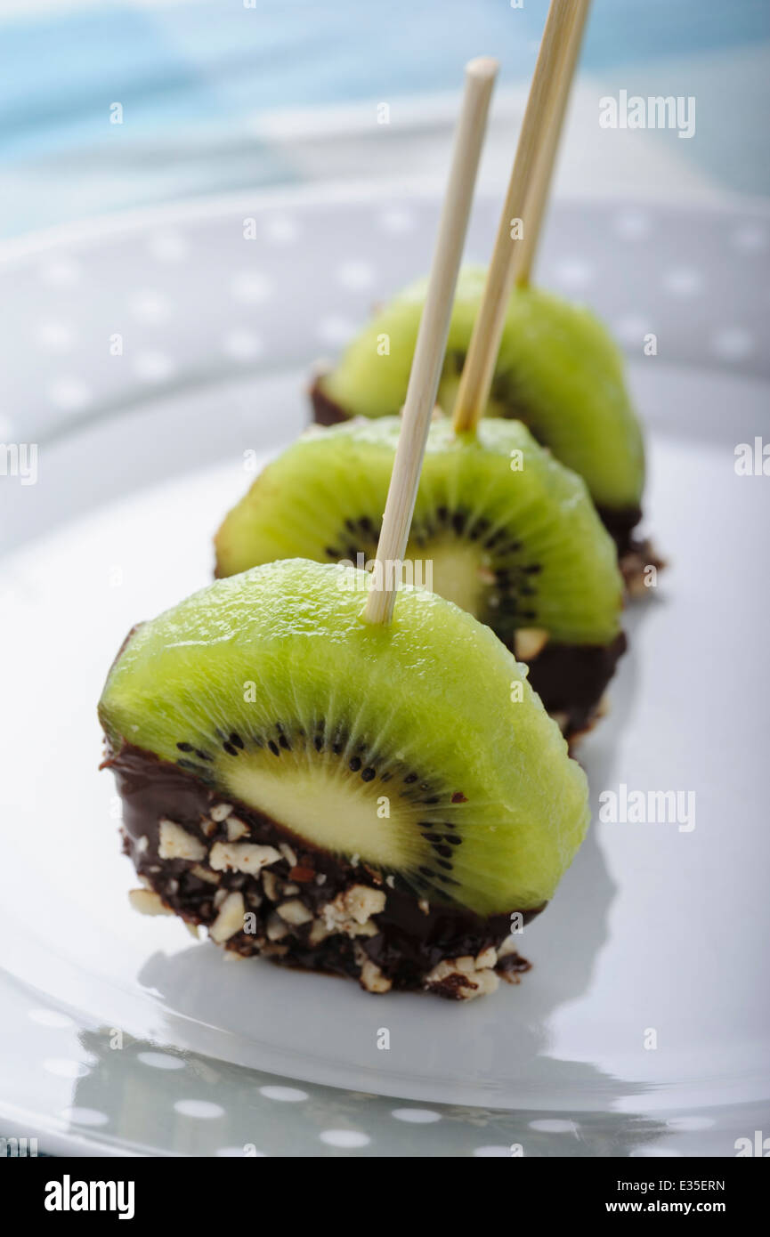 Chocolatecovered kiwi pops Stock Photo Alamy