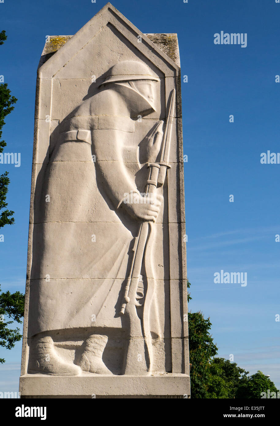 Stone sculpted war memorial at Chirk, Wales, by Eric Gill. Stock Photo