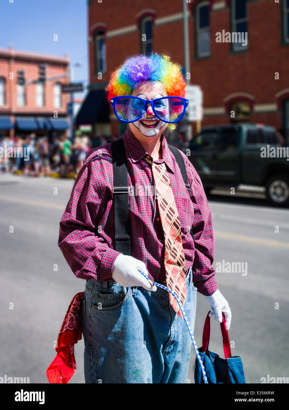 Clown in annual FIBark Parade in small mountain town of Salida, Colorado, USA Stock Photo