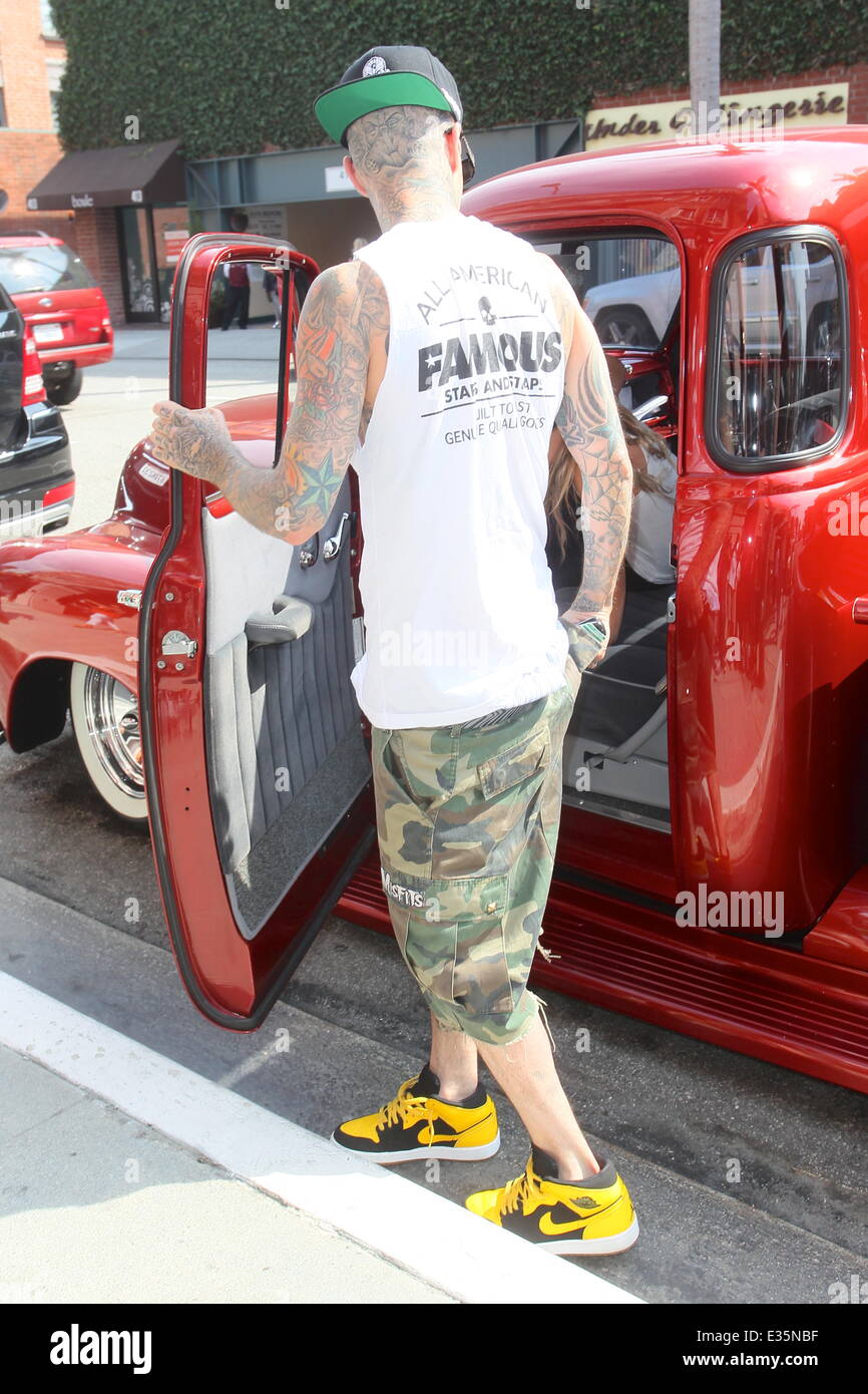 Travis Barker and his daughter Alabama Luella Barker stop for a cold