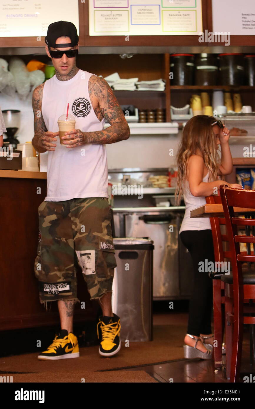 Travis Barker and Daughter Alabama Luella Barker seen getting a drink