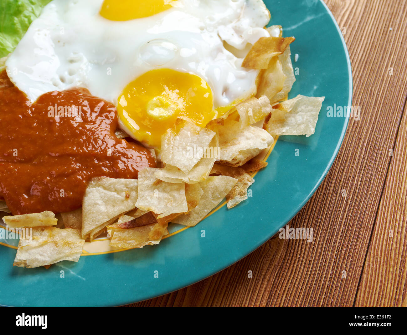 Huevos con chilaquiles Mexican traditional breakfast eggs. Eggs with