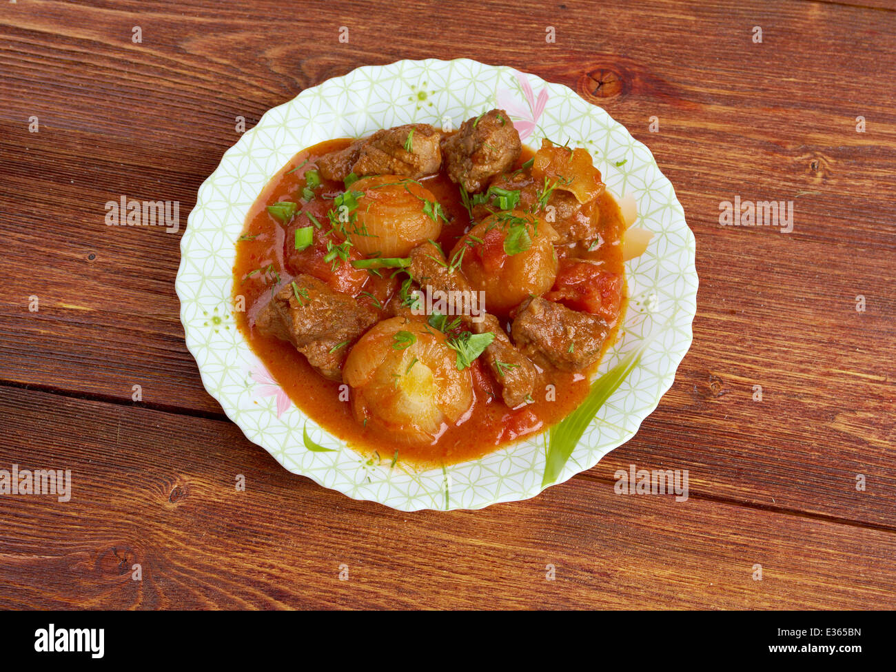 Traditional Greek beef stifado Stock Photo - Alamy