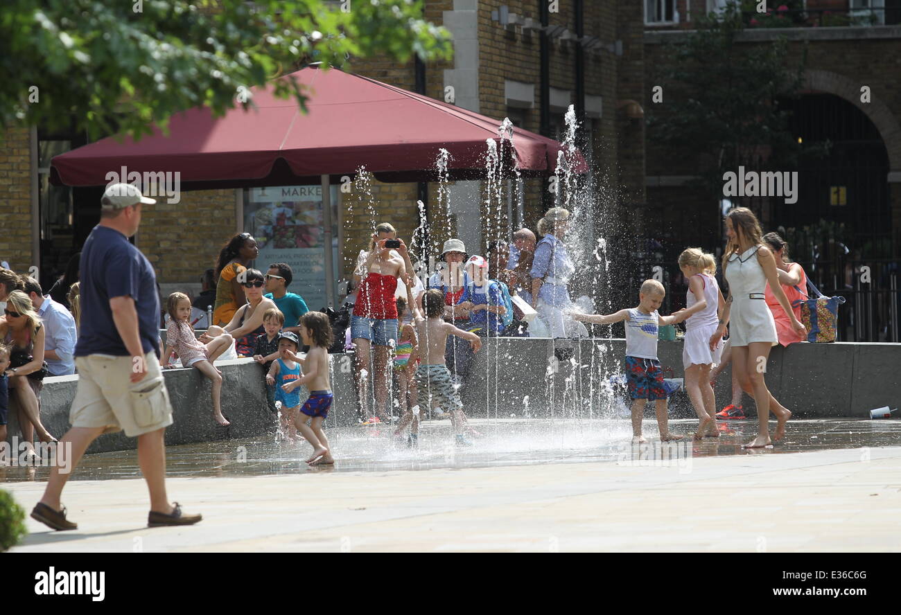 Members of the public enjoying the hot weather in Chelsea. Featuring