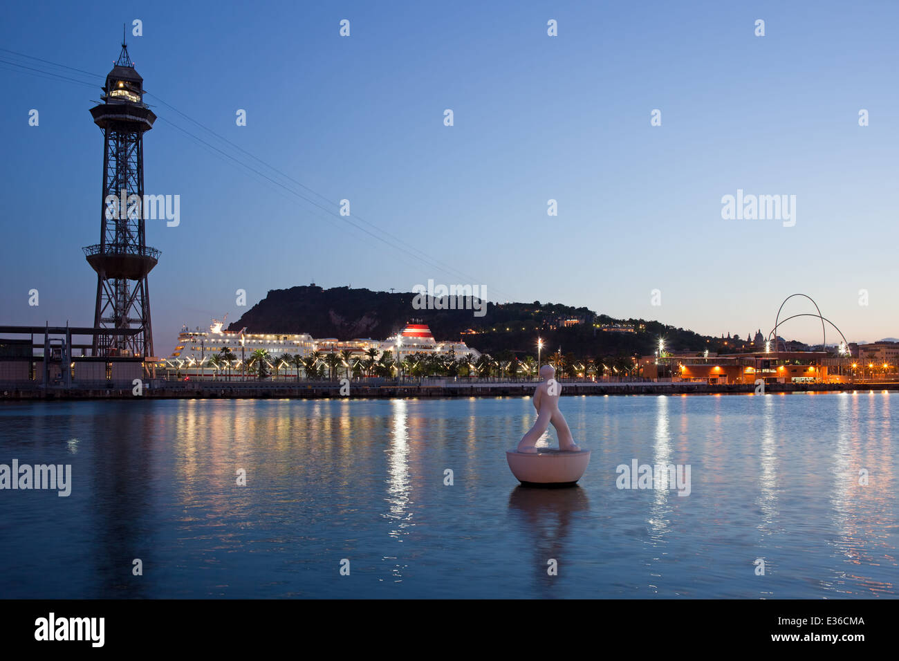 Montjuic cable car tower (Torre Jaume I) and bay at twilight in Barcelona, Catalonia, Spain. Stock Photo