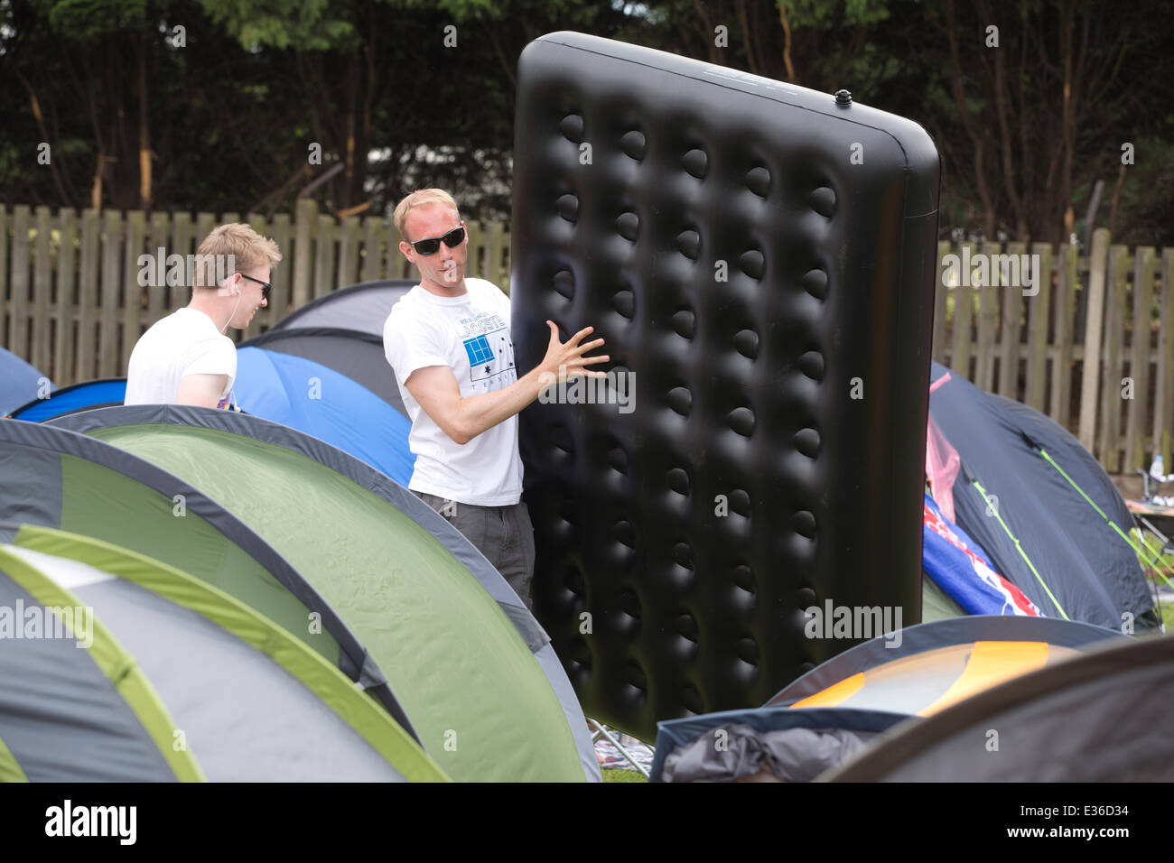 Wimbledon Park, London, UK. 22nd June, 2014. Tennis enthusiasts camp in Wimbledon Park overnight hoping to get a ticket for the opening match in Centre Court to see Andy Murray defend his title. Credit:  Clickpics/Alamy Live News Stock Photo