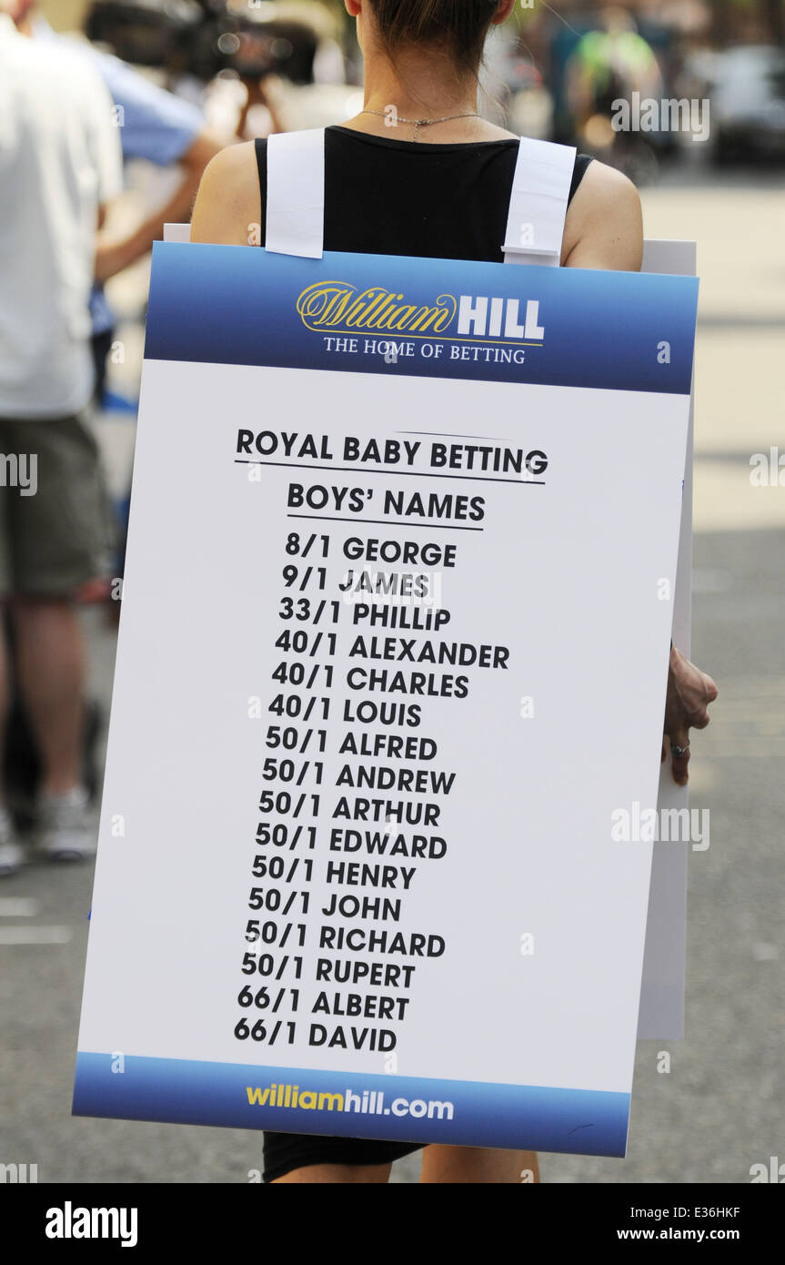 A girl from a Betting Company wears a board highlighting the latest odds on babies names outside the Lindo wing of St Mary's Hospital ahead of the birth of The Duke and Duchess of Cambridge's first child  Where: London, United Kingdom When: 17 Jul 2013 Stock Photo
