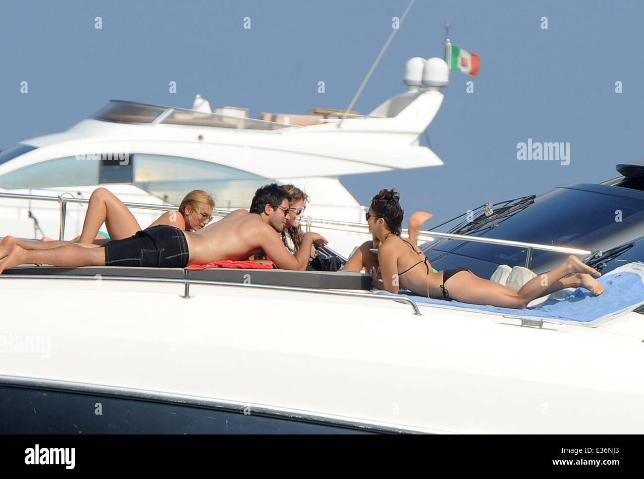 Vanessa Hudgens spends time on a boat with friends, including film directors Eli Roth and Terry Gilliam.  Featuring: Vanessa Hud Stock Photo