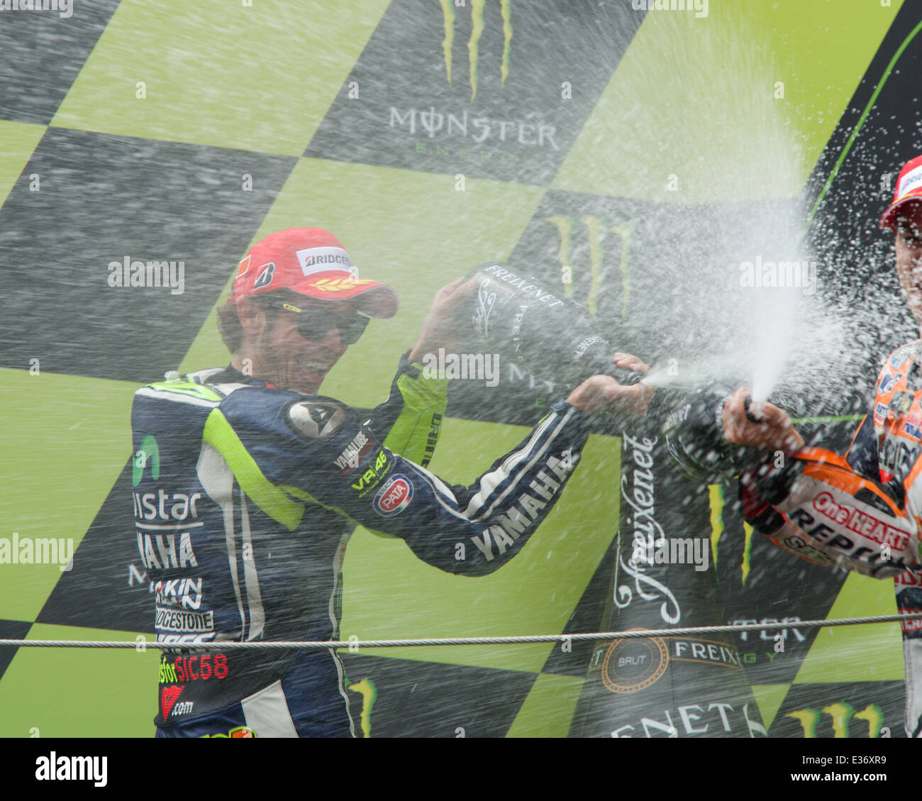Valentino Rossi sprays champagne on the podium at Catalunya Circuit
