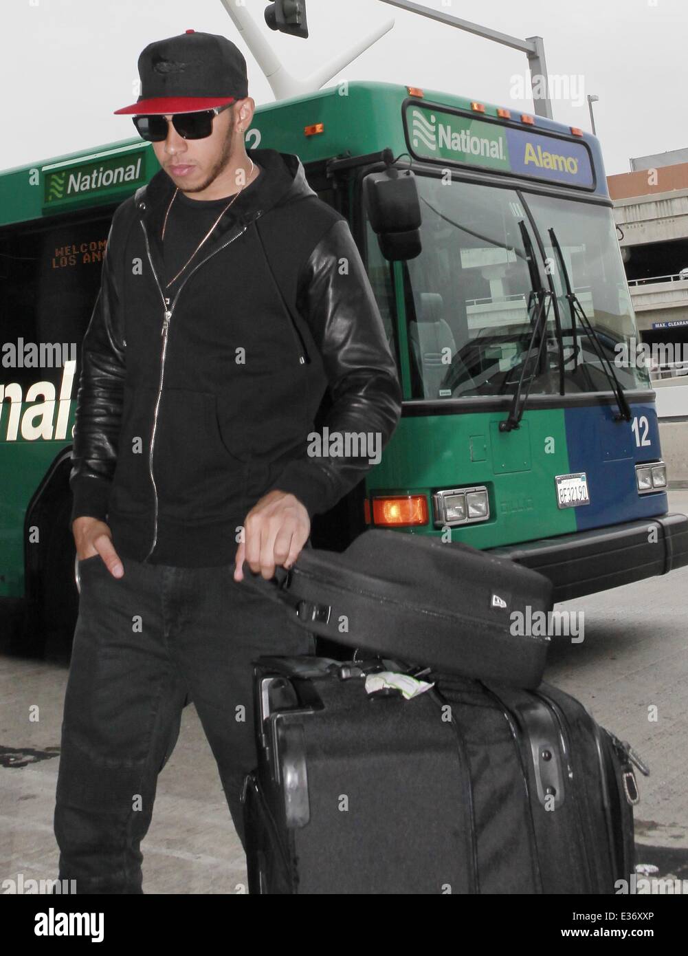 Formula One race car driver Lewis Hamilton arrives at LAX airport