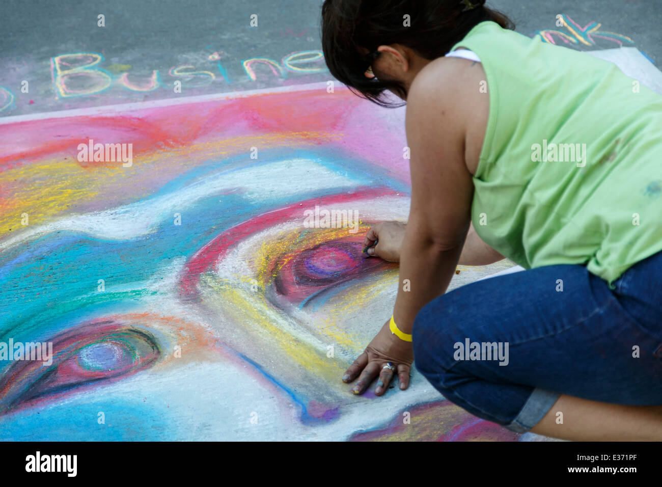 Artist working on chalk art piece, Chalk Art Festival, Larimer Square, Denver, Colorado USA Stock Photo