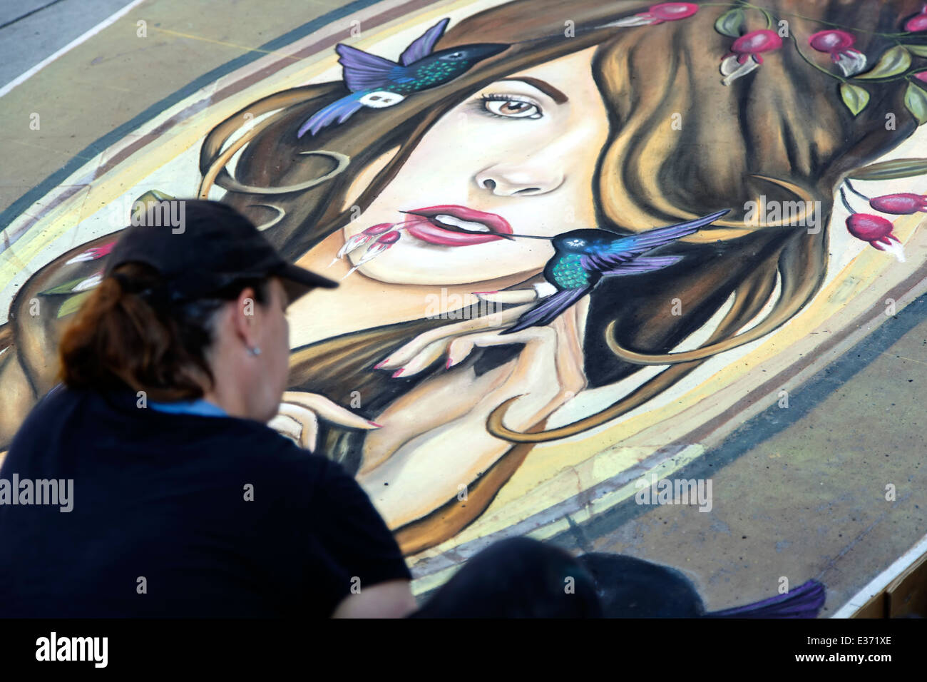 Artist working on chalk art piece, Chalk Art Festival, Larimer Square