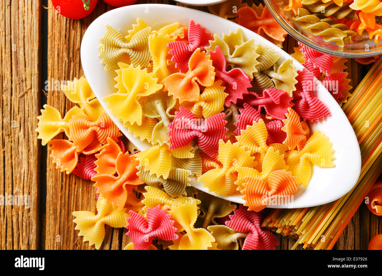 Flavored and colored bow tie pasta Stock Photo Alamy