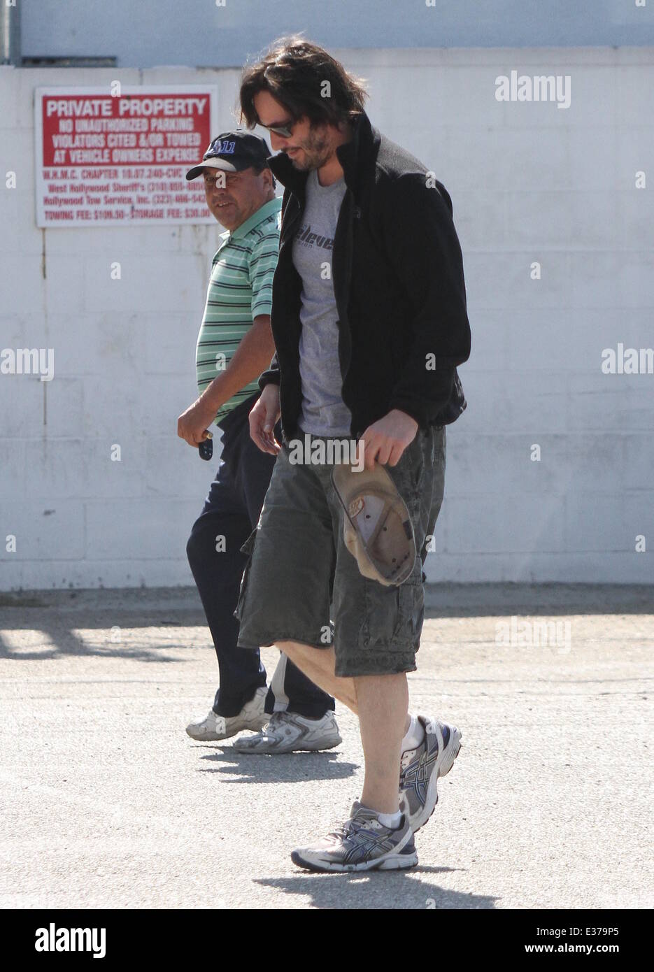 Keanu Reeves dressed casually as he goes to a gym in West Hollywood Featuring Keanu Reeves