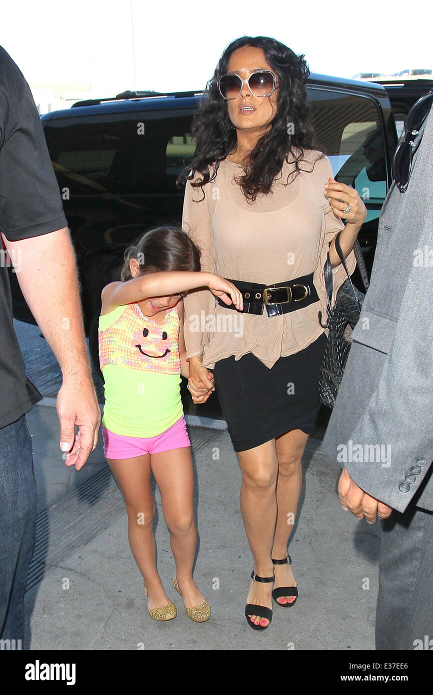 Salma Hayek and daughter Valentina Pinault seen arriving at LAX Airport