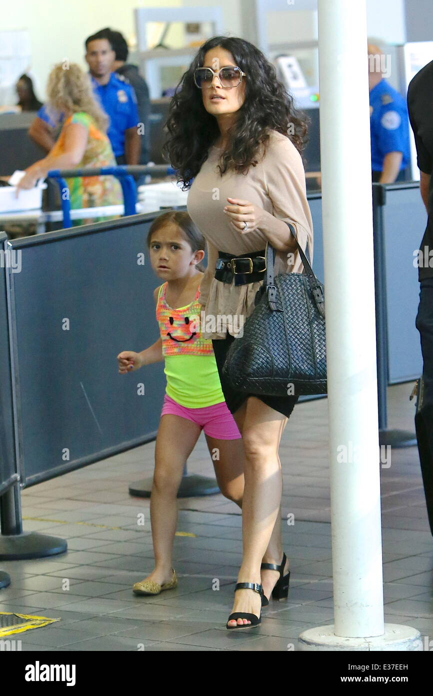 EXCLUSIVE!! Actress Salma Hayek, husband Francois-Henri Pinault and  daughter Valentina end their Fourth of July holiday with a family walk on  the beach. Malibu, CA. 7/4/11 Stock Photo - Alamy