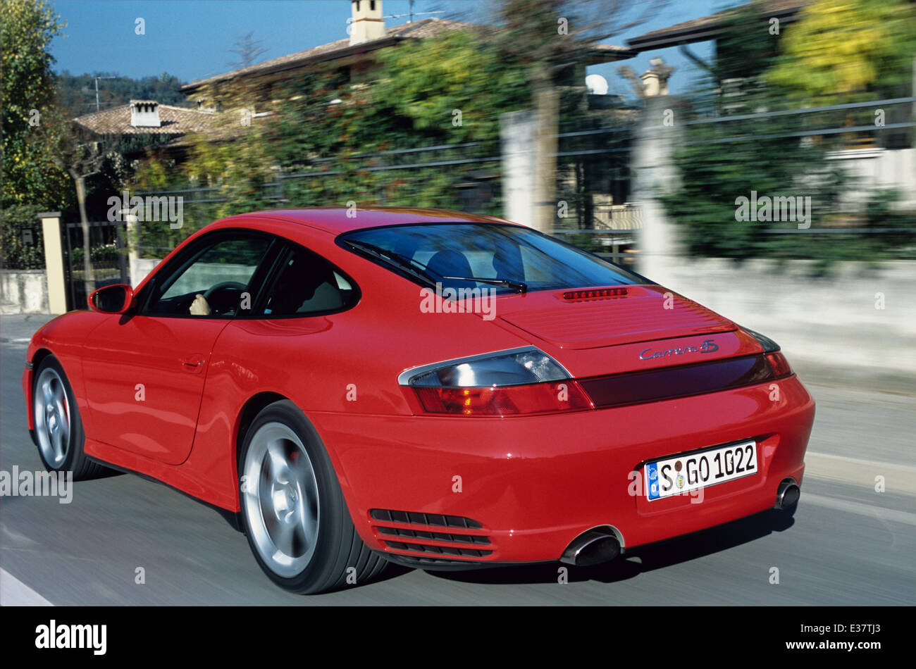 Porsche 911 Carrera 4S - 996 Model - 2001 in red - rear three quarter view Stock Photo